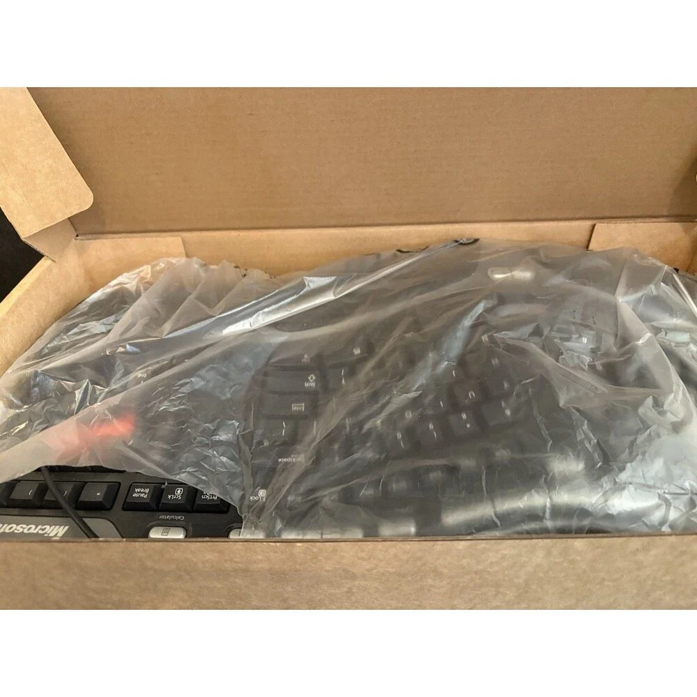 Microsoft Natural Ergonomic Keyboard 4000 v1.0 Wired USB KU-0462 Model 1048